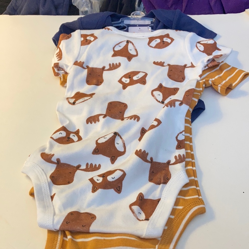FINAL MARKDOWN NWT three pack carter’s just one you one pieces (9 months)